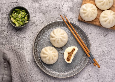 Photo for Food photography of steamed bun, bao, duck meat, spring onion, chinese, dough, dumpling, asian, stuffed, meat, savoury pastry, vietnam - Royalty Free Image