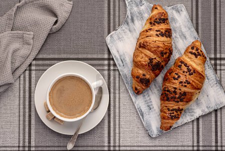 Photo for Food photography of Croissant, Coffee, Cappuccino, Breakfast, Caffeine, Baked,  Gourmet, Eating, Latte, Table, Restaurant, Cafe - Royalty Free Image