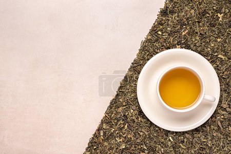Photo for Blank photography of green tea; herb; herbal; dry; natural; drink; petal; mug; cup; hot; grass; beverage; jasmine; leaf; healthy - Royalty Free Image