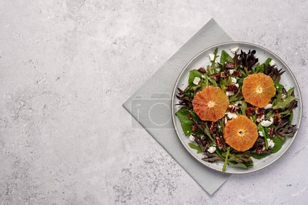 Photo for Blank food photography of salad with bloody orange, leaf, mix, spinach, red lettuce, rocket, feta cheese, caramelized pecan, nut, place, space - Royalty Free Image