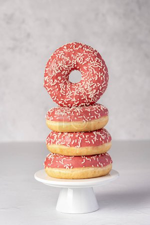 Photo for Food photography of donuts, glazed, bagel, bakery, baking, pastry, pink, treat, dessert, sprinkles, calories, icing, candy - Royalty Free Image