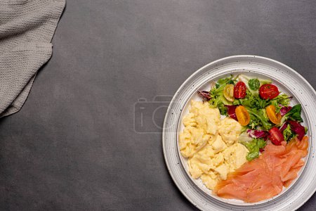 Photo for Blank food photography of scrambled egg; smoked salmon; breakfast; brunch; omelette; salad, tomato, lettuce, keto diet, background - Royalty Free Image