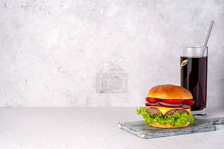 Photo for Blank food photography of hamburger; cheese; sandwich; beef; bun; lettuce; tomato; onion; soda; drink; cola; background - Royalty Free Image