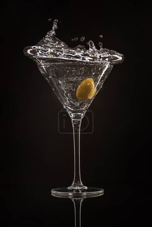 Photo for Drink photography of cocktail; martini, olive, splash, drop, wave, gin, tonic, shot, mocktail; rum; beverage; drink - Royalty Free Image