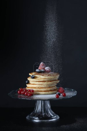 Photo for Stack of Fresh Pancakes on a Glass Stand - Royalty Free Image
