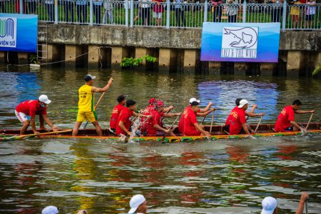 Photo for Ho Chi Minh, Viet Nam - 23 April 2023: Blurry motion of boat racing in the traditional Ngo boat racing festival of Khmer people - Royalty Free Image