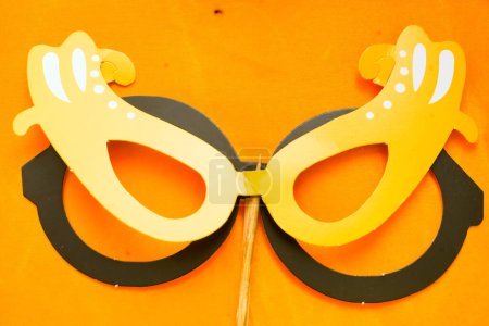 Photo for A collection of stock photos of stick half party masks. These masks are perfect for any party or event, and they come in a variety of styles and colors. Whether you're looking for a scary mask - Royalty Free Image