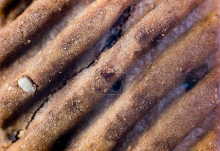 This image features a mouthwatering close-up view of chocolate chip cookies