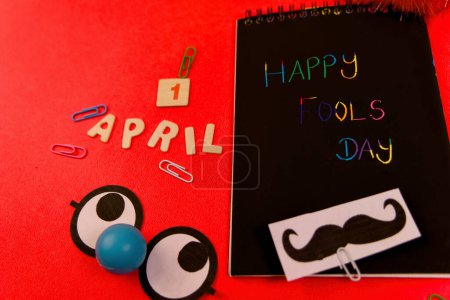 Get ready to giggle This playful image features the message "Happy Fools Day" displayed on a weathered wooden surface