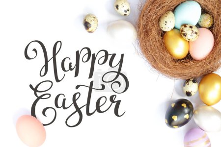 Foto de Bright easter eggs with happy Easter lettering, holiday concept. Selective focus. - Imagen libre de derechos
