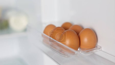 Photo for Fresh farm eggs in the fridge. High quality 4k footage - Royalty Free Image