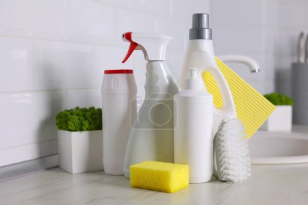 Photo for A set of different cleaning and disinfection products against the background of the home interior . High quality photo - Royalty Free Image