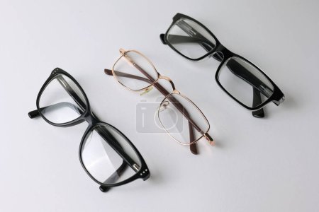 Photo for Glasses for vision correction on a light background with a place for text. High quality photo - Royalty Free Image