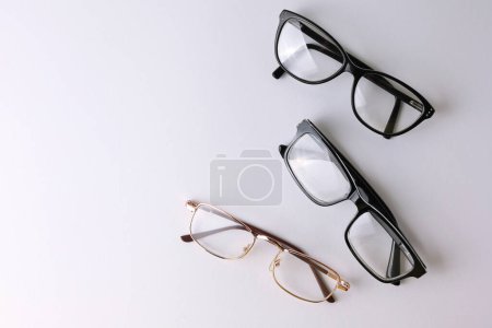 glasses for vision correction on a light background with a place for text. High quality photo