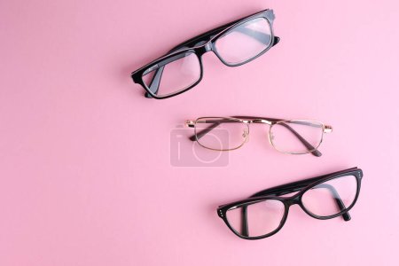 Photo for Glasses for vision correction on a colored background with space for text. High quality photo - Royalty Free Image