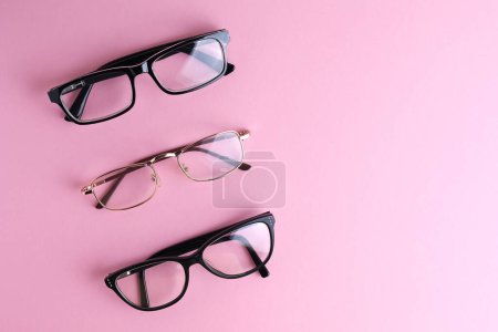 Photo for Glasses for vision correction on a colored background with space for text. High quality photo - Royalty Free Image