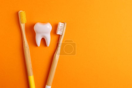 Photo for Different toothbrushes on a colored background. Dental care, oral health. High quality photo - Royalty Free Image