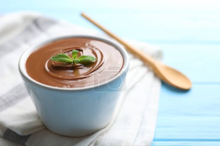 Photo for Chocolate paste with a bowl on a table. . High quality photo - Royalty Free Image
