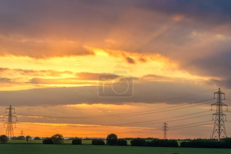 Photo for Electric transmission tower at sunset - Royalty Free Image