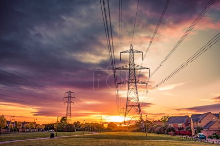 Photo for Hight voltage electric towers at sunset - Royalty Free Image