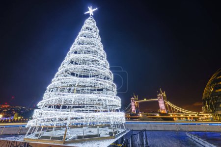 Photo for Tower Bridge and a Christmas tree in London - Royalty Free Image