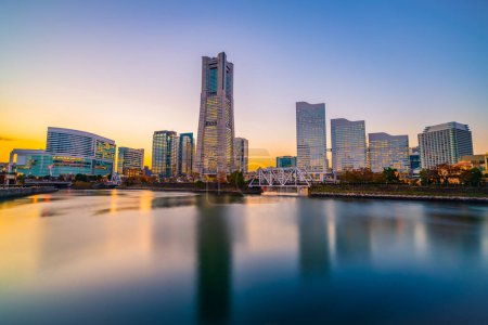Photo for Yokohama city skyline at sunset viewed from the bay - Royalty Free Image