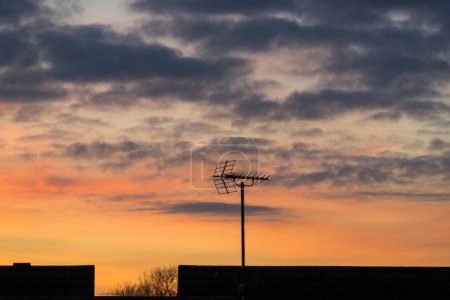 Photo for TV antenna with sunset sky - Royalty Free Image