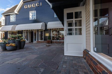 Photo for BICESTER, ENGLAND - JULY 5, 2016.. Gucci shop at Bicester Village. Bicester Village is an outlet shopping centre on the outskirts of Bicester, a town in Oxfordshire - Royalty Free Image