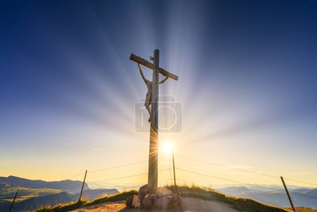 Photo for Jesus Christ on the Cross with sun rays - Royalty Free Image