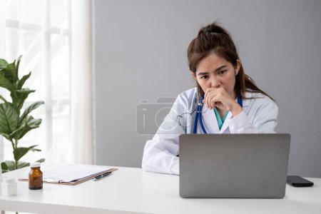 Photo for Young woman female doctor stressed angry unhappy overworked overtime fatigue at office clinic hospital - Royalty Free Image