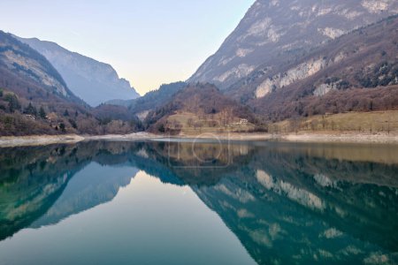 The view of Lake Tenno in spring,Trento,Italy, Europa. Turquoise lake in the mountains in a sunny day