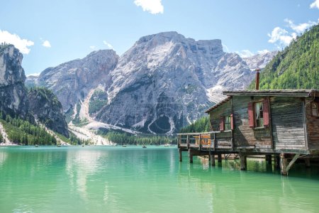 Photo for Lake Braies (also known as Pragser Wildsee or Lago di Braies) in Dolomites Mountains, Sudtirol, Italy. Romantic place with typical wooden boats on the alpine lake. Hiking travel and adventure. - Royalty Free Image
