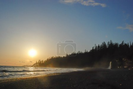 Photo for A west coast sunset near Tsusiat Falls on the West Coast Trail, Vancouver Island, Canada - Royalty Free Image