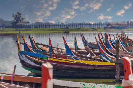 Photo for Colorful Wooden boat in front of Ubein Bridge - Royalty Free Image