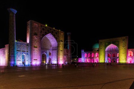 Tilya-Kori Madrasah with lights on Registan square
