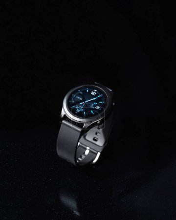 Photo for Close up of wristwatch on black background, vintage watch concept. - Royalty Free Image