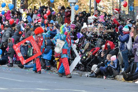 Toronto, ON, Canada  November 17, 2019: People in costumes take part in the Toronto Santa Claus Parade in Downtown.