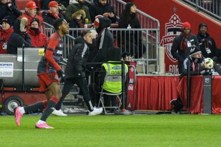 Photo for Toronto, ON, Canada -March 23, 2024:    Head Coach of the Toronto FC John Herdman looks at the field during the MLS Regular Season match between Toronto FC (Canada) and  Atlanta United (USA) at BMO Field (Score 2:0) - Royalty Free Image
