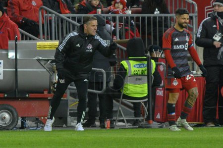 Photo for Toronto, ON, Canada -March 23, 2024:    Head Coach of the Toronto FC John Herdman looks at the field  during the MLS Regular Season match between Toronto FC (Canada) and  Atlanta United (USA) at BMO Field (Score 2:0) - Royalty Free Image