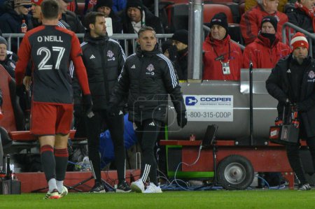 Photo for Toronto, ON, Canada -March 23, 2024:    Head Coach of the Toronto FC John Herdman looks at the field  during the MLS Regular Season match between Toronto FC (Canada) and  Atlanta United (USA) at BMO Field (Score 2:0) - Royalty Free Image