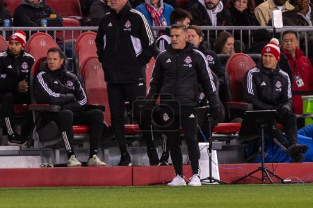 Photo for Toronto, ON, Canada - April 20, 2024: Head Coach of the Toronto FC John Herdman looks at the field during the MLS Regular Season match between Toronto FC (Canada) and New England Revolution (USA) at BMO Field - Royalty Free Image
