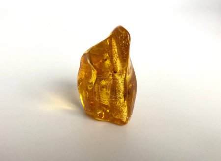 Photo for Polished nugget of Baltic amber found in Kolobrzeg, Poland. - Royalty Free Image