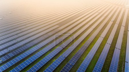 A picture showcasing a vast, contemporary photovoltaic solar farm.