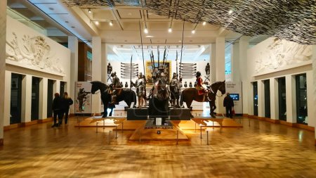 Photo for Royal Armouries Museum, Leeds, United Kingdom - February 2, 2018: cavalry statues display in the middle of the exhibition hall with light from the ceiling - Royalty Free Image
