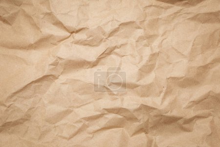 Téléchargez les photos : Texture de papier froissé brun, vieille surface de papier pour le fond. - en image libre de droit