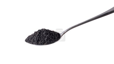 Photo for Black seeds, also known as black cumin or caraway or kalonji, on a spoon isolated on white background - Royalty Free Image