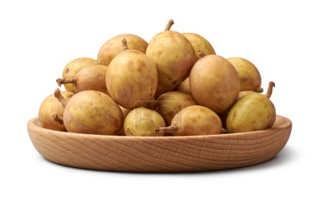 ripe lanzones, lansium parasiticum, tropical fruit native to southeast asia, widely cultivate for small, round fruits its sweet and tangy flavor on wooden tray, isolated on white background