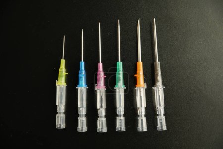Photo for Syringe and syringes on black background - Royalty Free Image