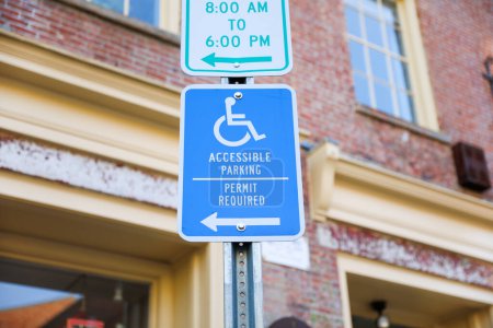 Photo for The handicap sign is a blue and white symbol of accessibility. It represents the need for barrier-free access for individuals with disabilities, ensuring their equal participation in society. - Royalty Free Image
