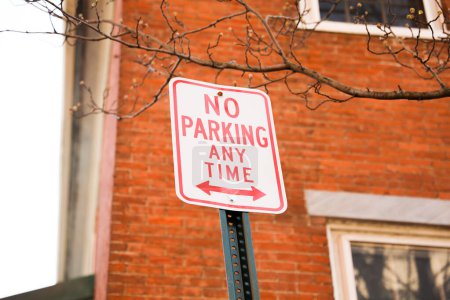 no parking sign typically represents rules, regulations, and restrictions. It is a symbol of order and control in public spaces, and the need to maintain safety and accessibility